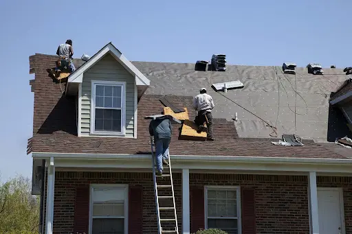 303 roofer removing an asphalt shingle roof